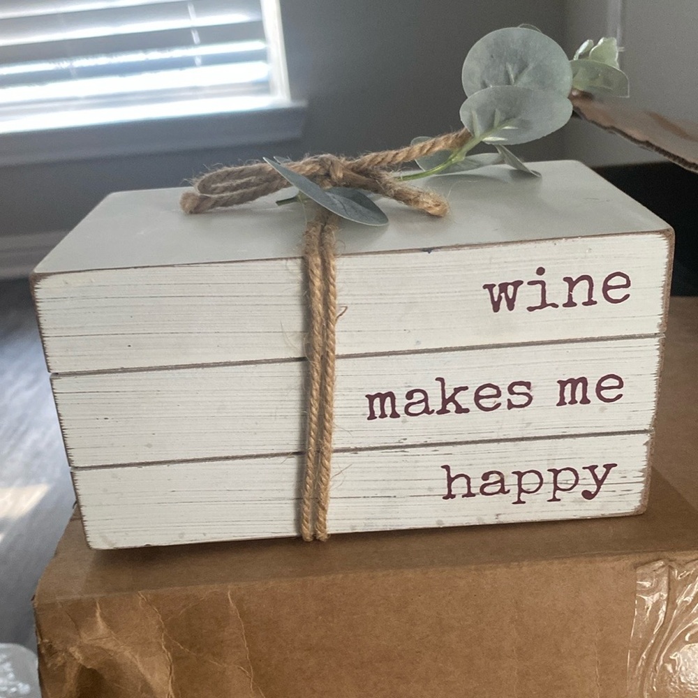 Decorative White Book Stack with Quote